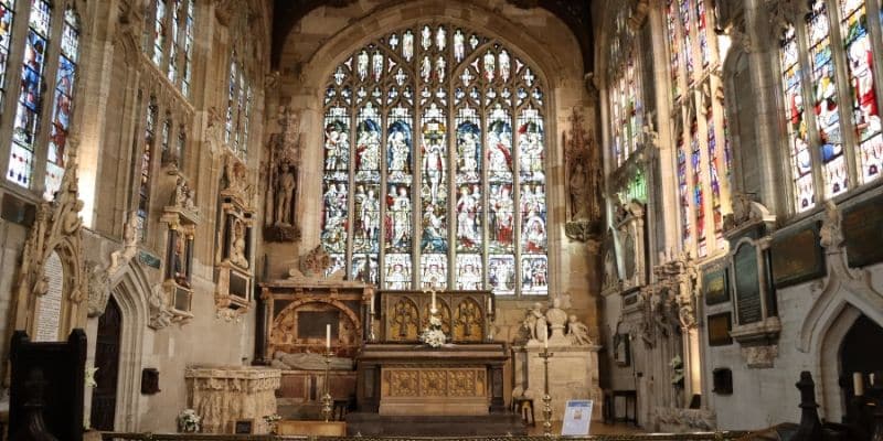 Stained glass windows around the chancel of Holy Trinity church